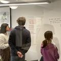 A-Level students looking at whiteboard