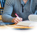 A person studying in a library