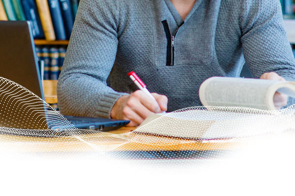 A person studying in a library