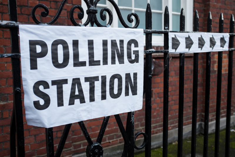 Image of sign outside of a polling station