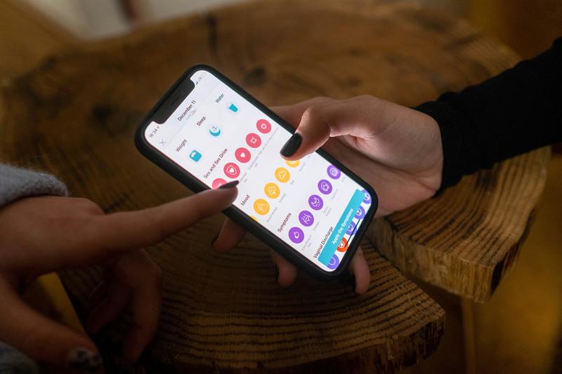 Image of a phone screen showing a period tracking app