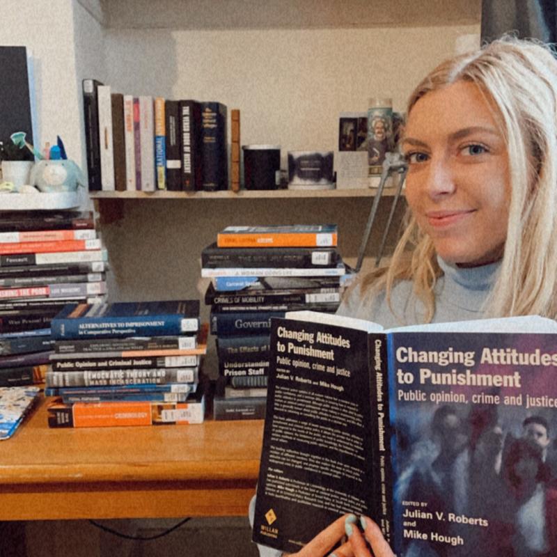 Helen surrounded by books