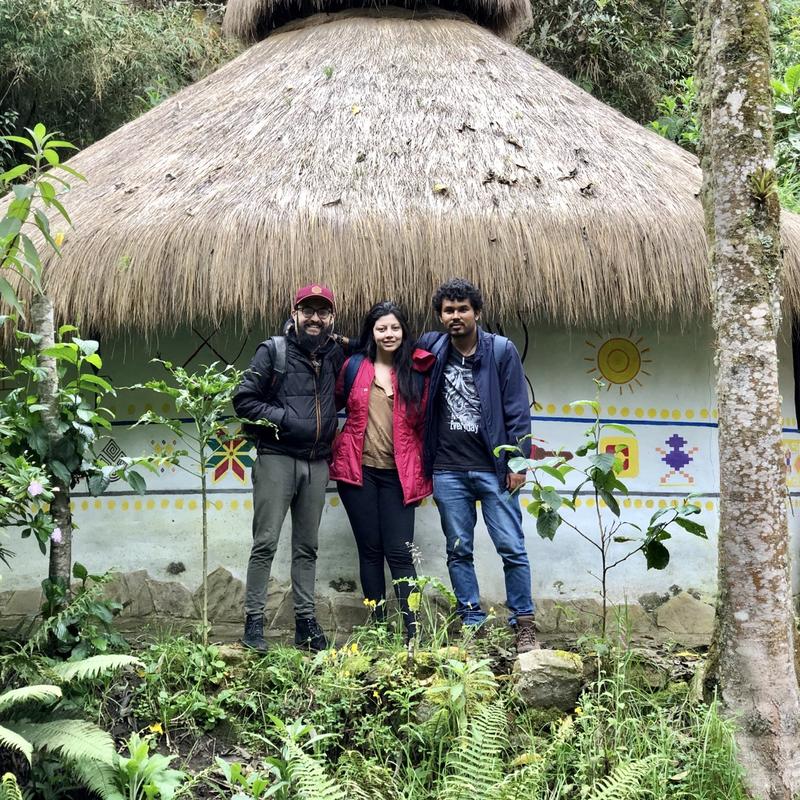Julián Gutiérrez-Martínez stands outside with two colleagues during a fieldwork trip to Colombia