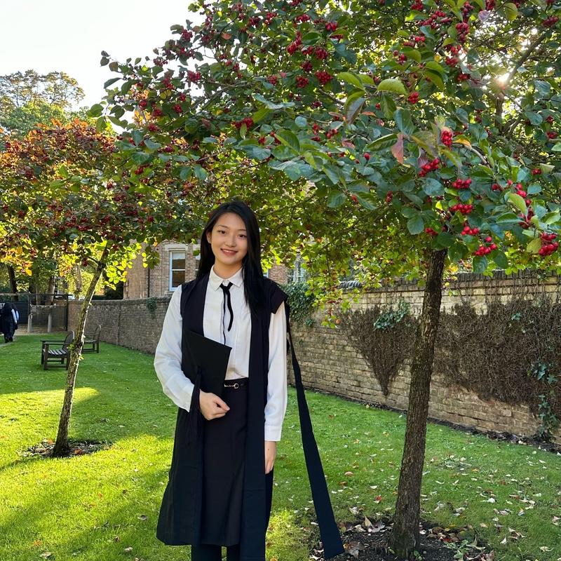 Image of Yanjing Lu in a garden at Kellogg College on the day of her Matriculation Ceremony