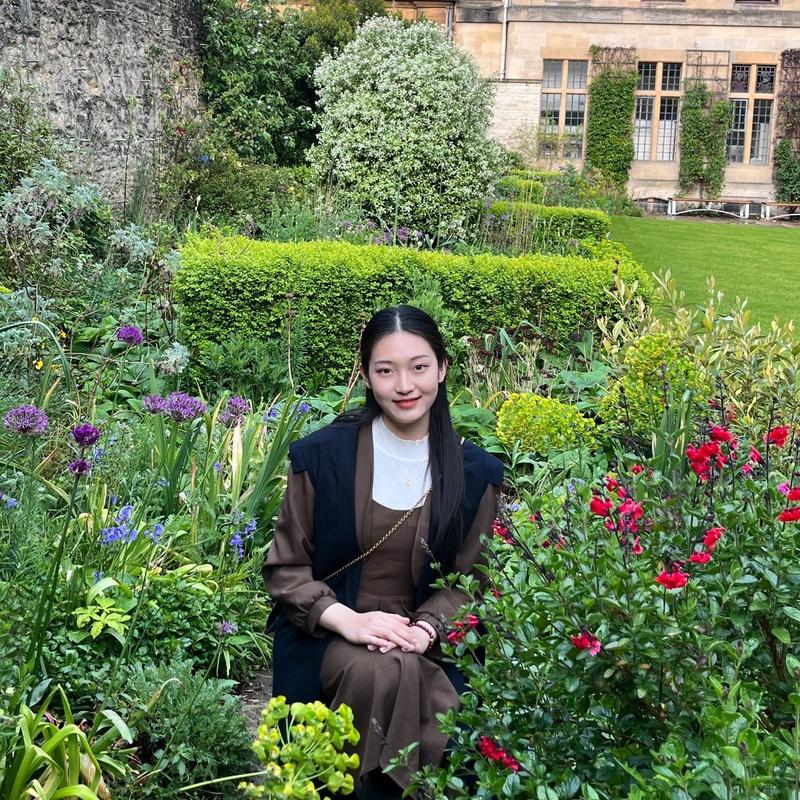 Yanjing Lu in the gardens of The Queen's College