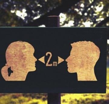 Silhouette heads of woman and man shown 2 metres apart