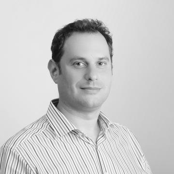 Black & white image of Jonathan Lusthaus