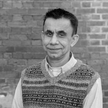 Black & white image of Khalid Omer