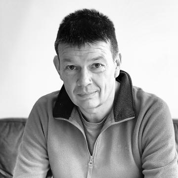 Black & white image of Martin Lee