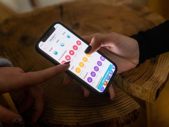 Image of a phone screen showing a period tracking app