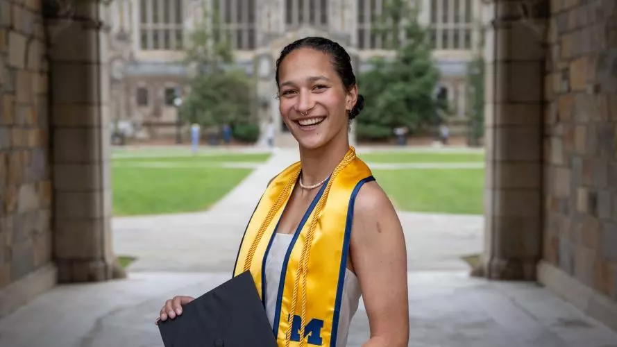 Image of Dakota J Betts at their undergrad graduation 