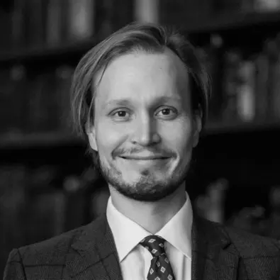 Black & white image of Vili Lehdonvirta