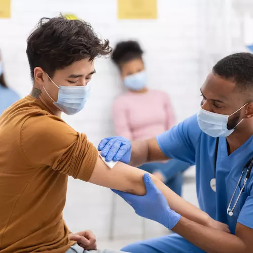 A person receiving an injection