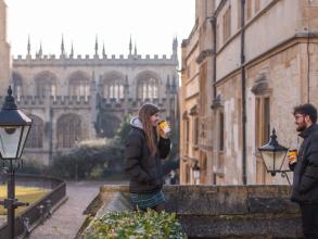 Two students meeting outside in Oxford. Photo credit: John Cairns