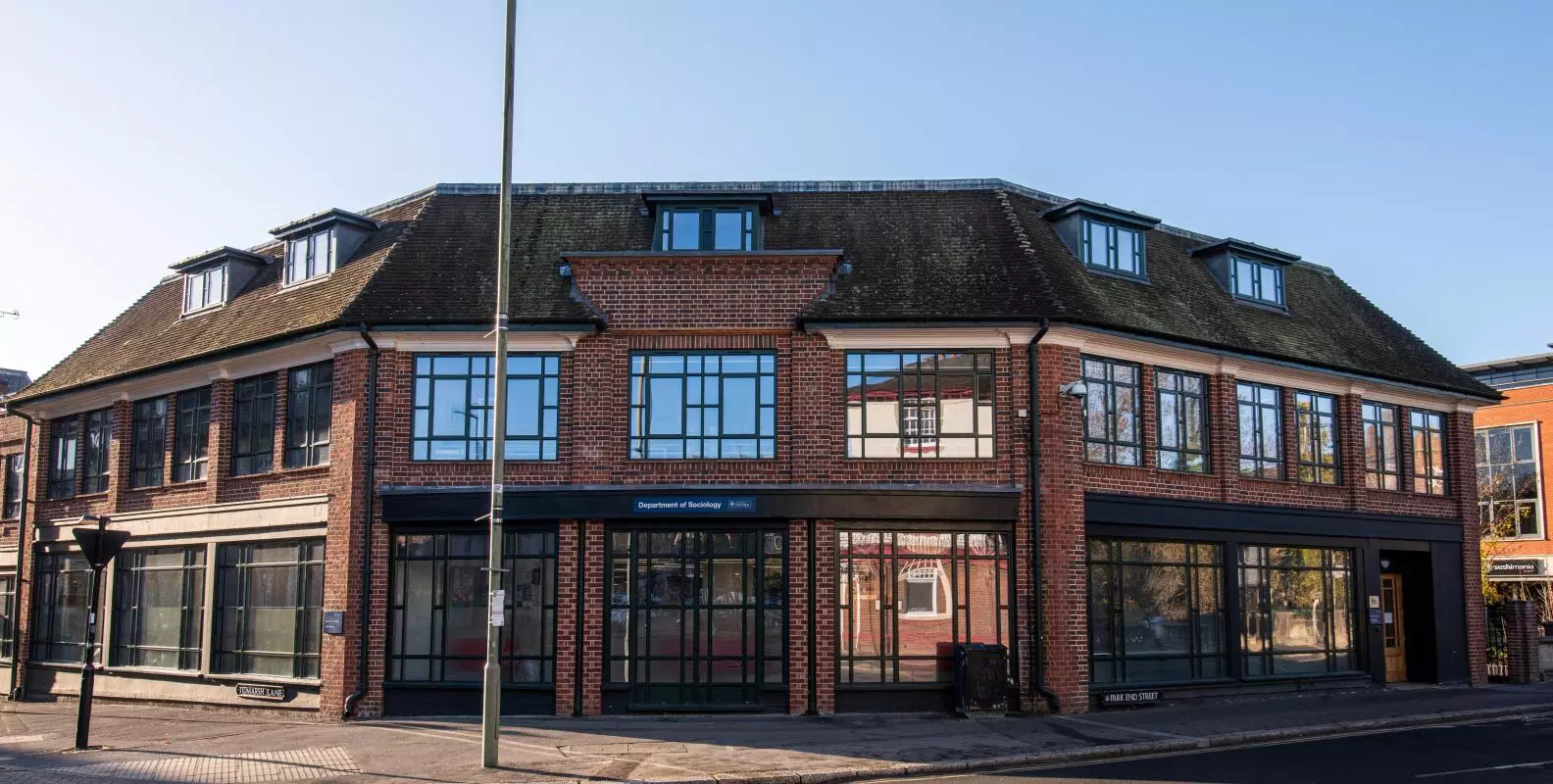 Image of the Department of Sociology building on a sunny day