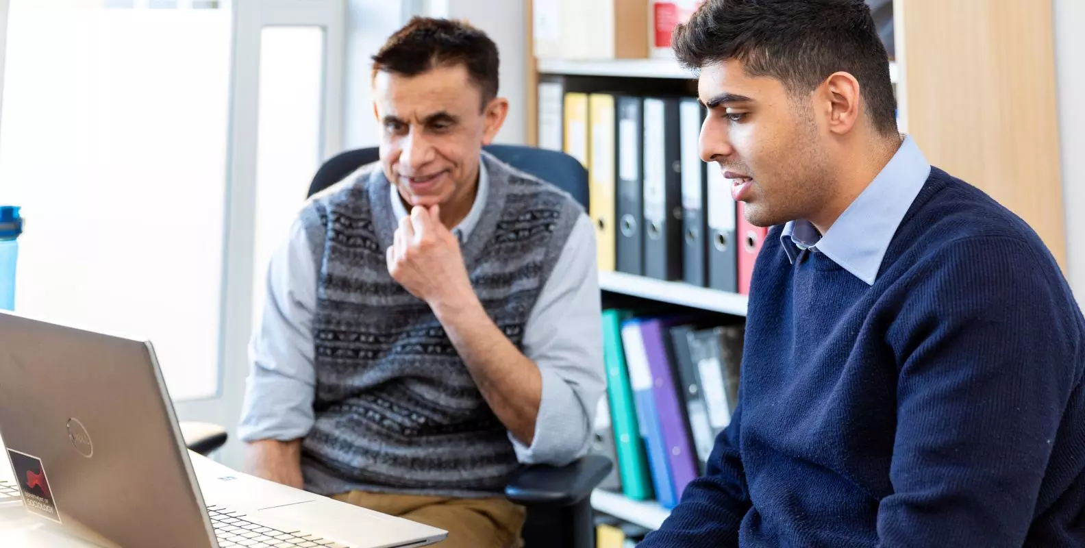 Image of two staff members working in the Department of Sociology